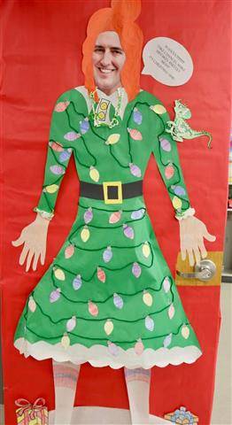 Woman&#39;s dress with holiday decorations on it