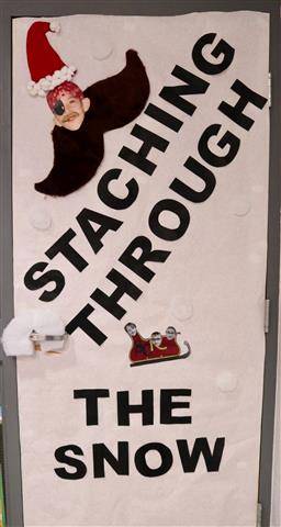 Big mustache with words, "Staching Through the Snow"