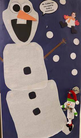 White snowman with blue background and snow