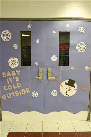 snowflakes with saying, "Baby it&#39;s cold outside" and a snowman