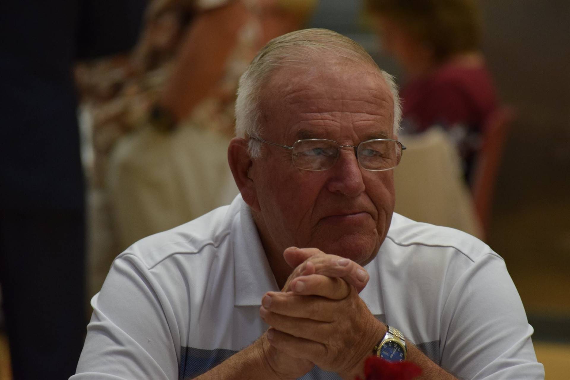 Man sitting during the dinner ceremony.