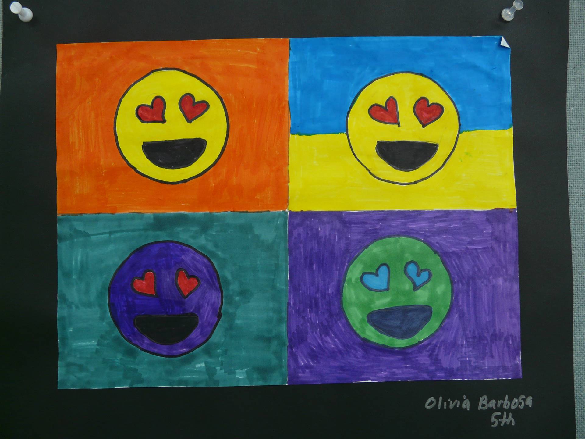 4 smiley faces in boxes-  all different colors with hearts at eyes