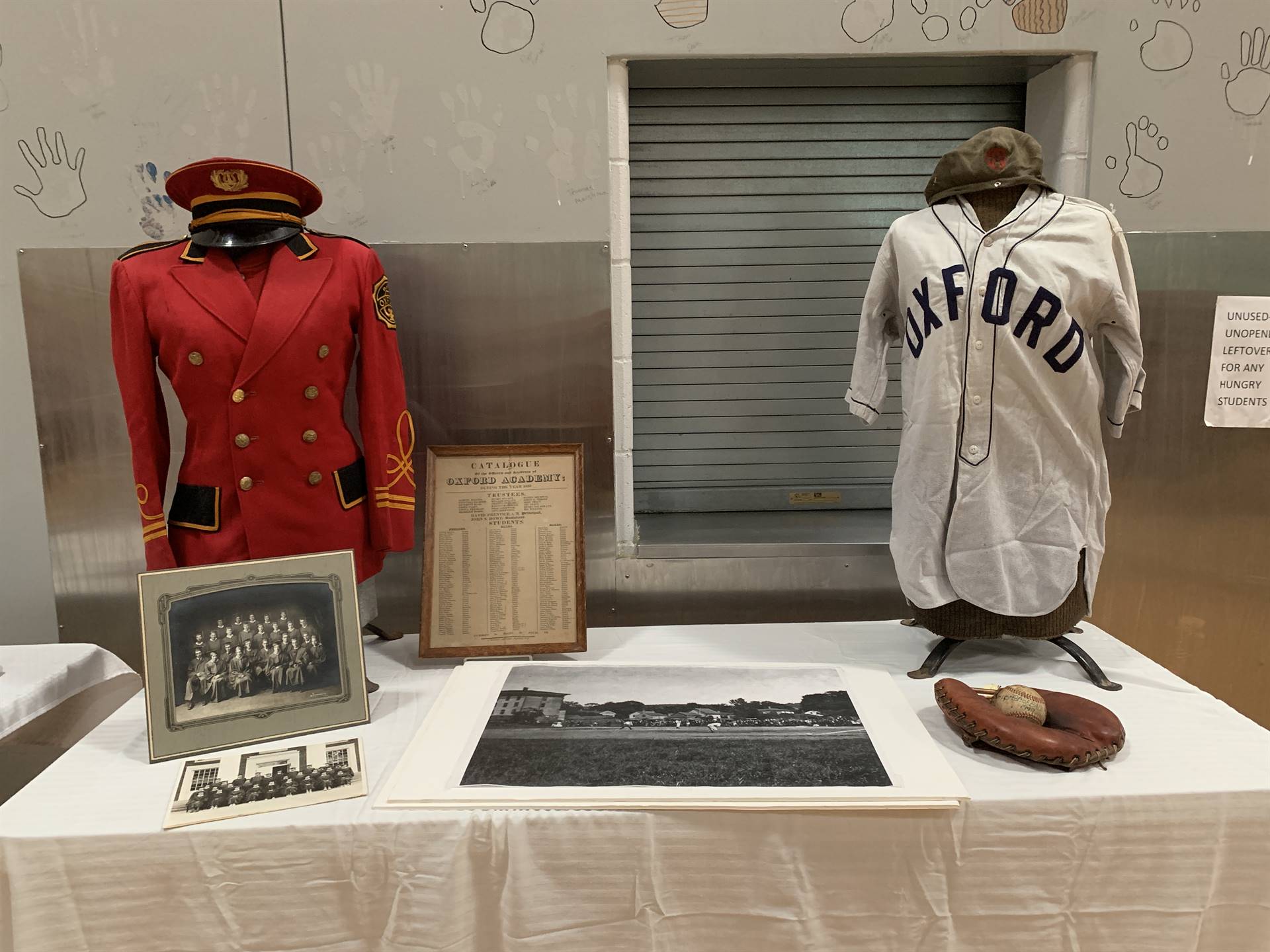 display table of old band and baseball uniforms