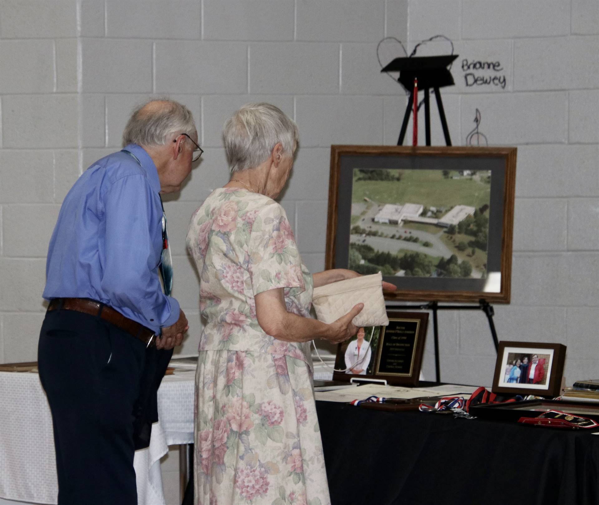 People viewing display table 