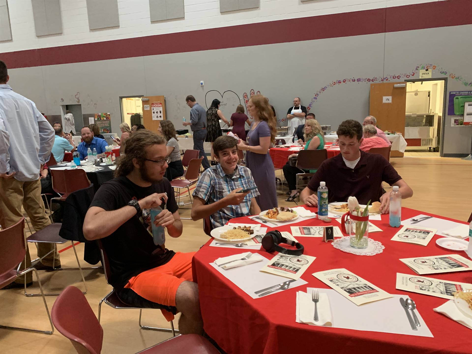 Student servers eating their dinner