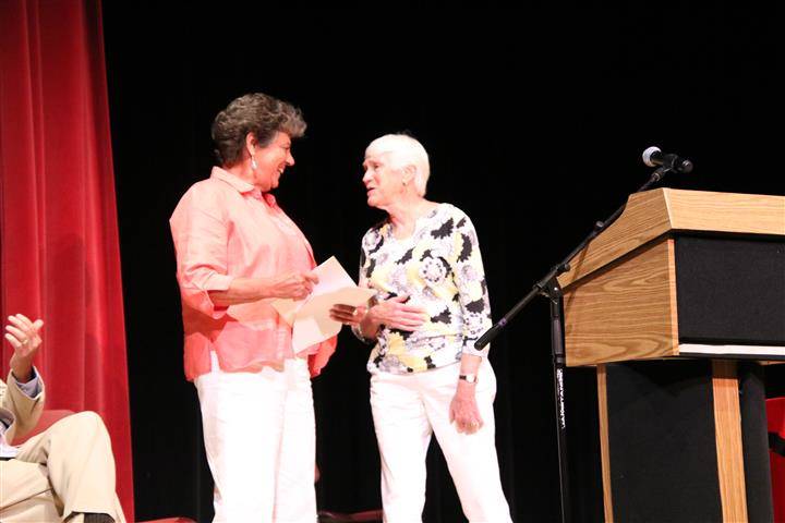 honoree with friend at podium