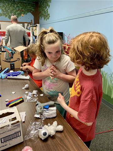 students making plastic objects