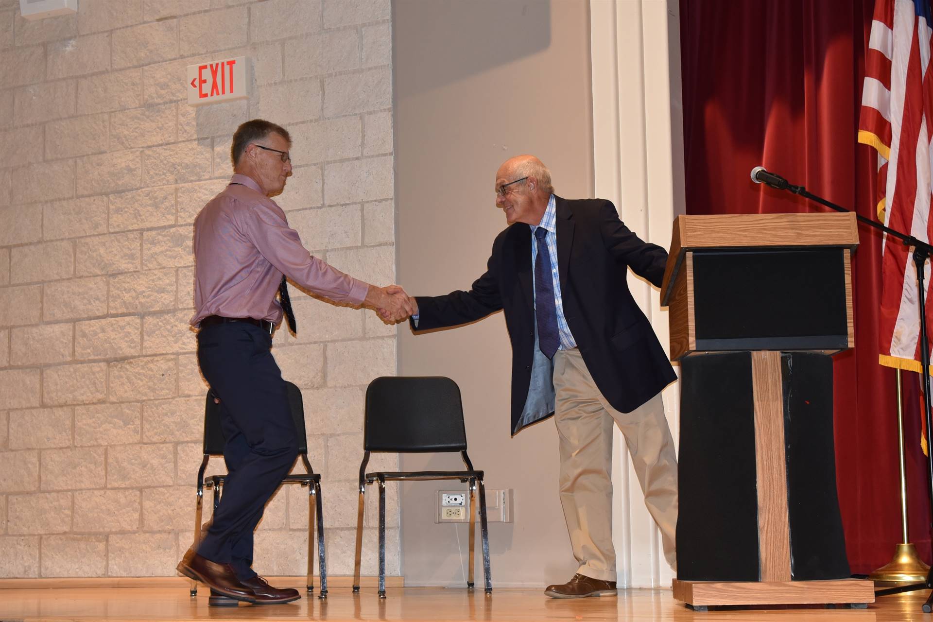 HOD honoree and presenter shaking hands