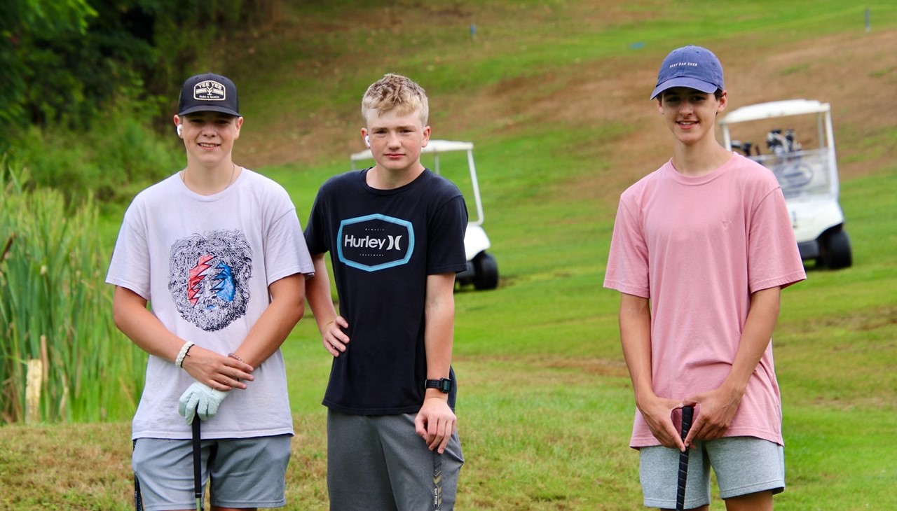 three male golfers