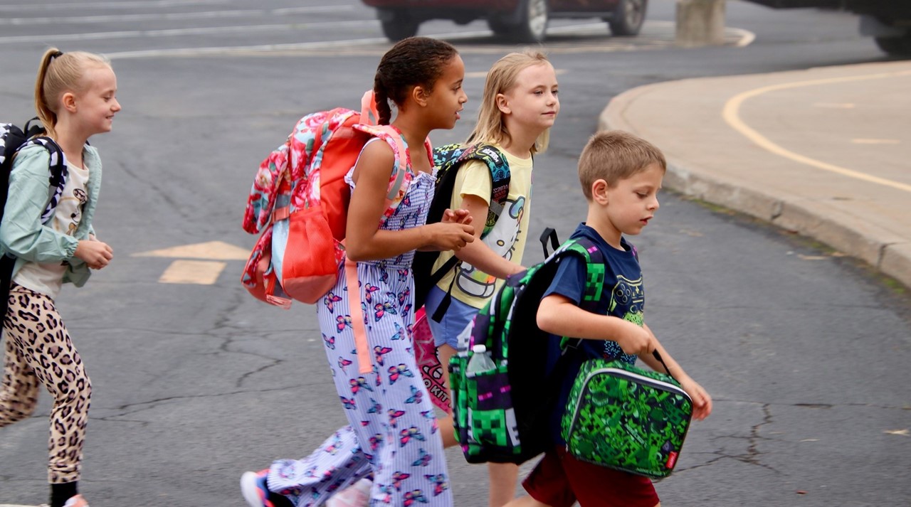 primary school children walking to school