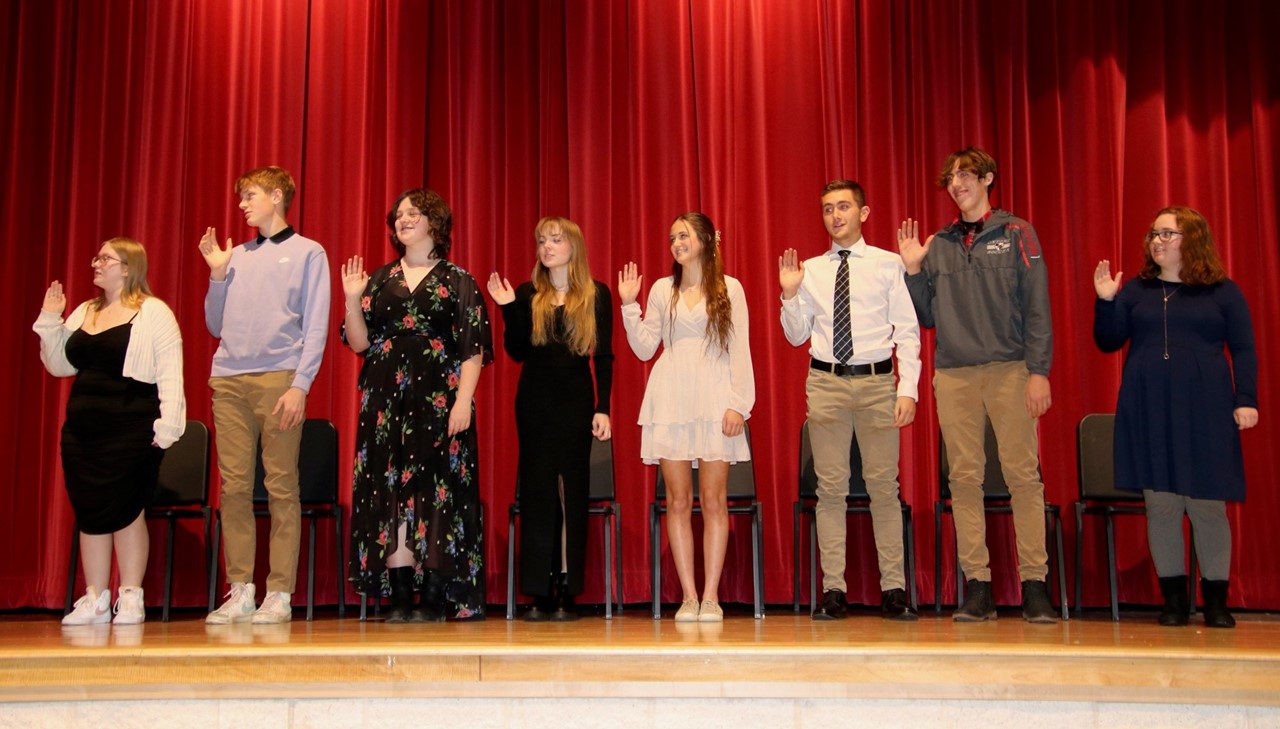 National honor society inductees pledging