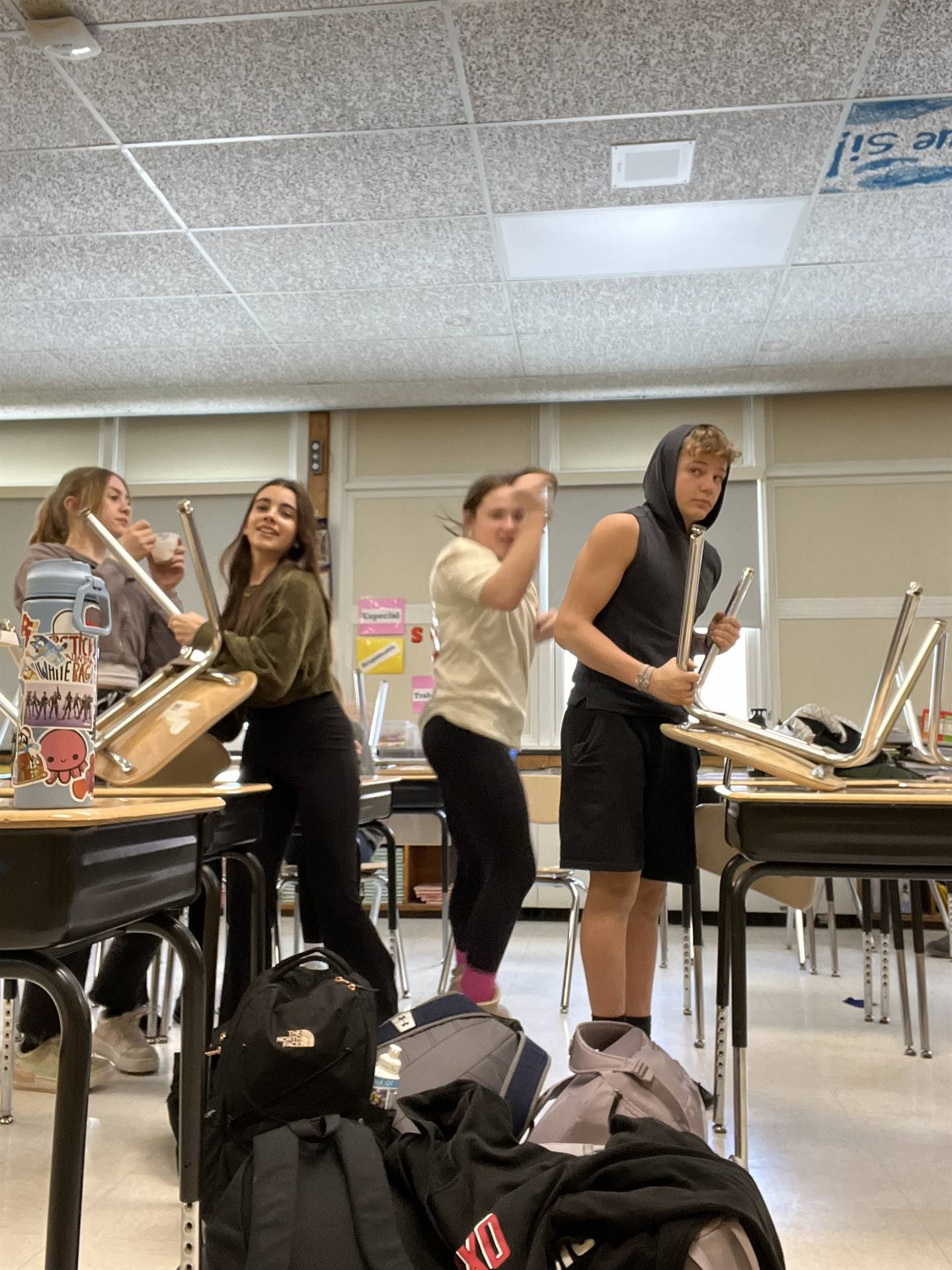 young people cleaning 