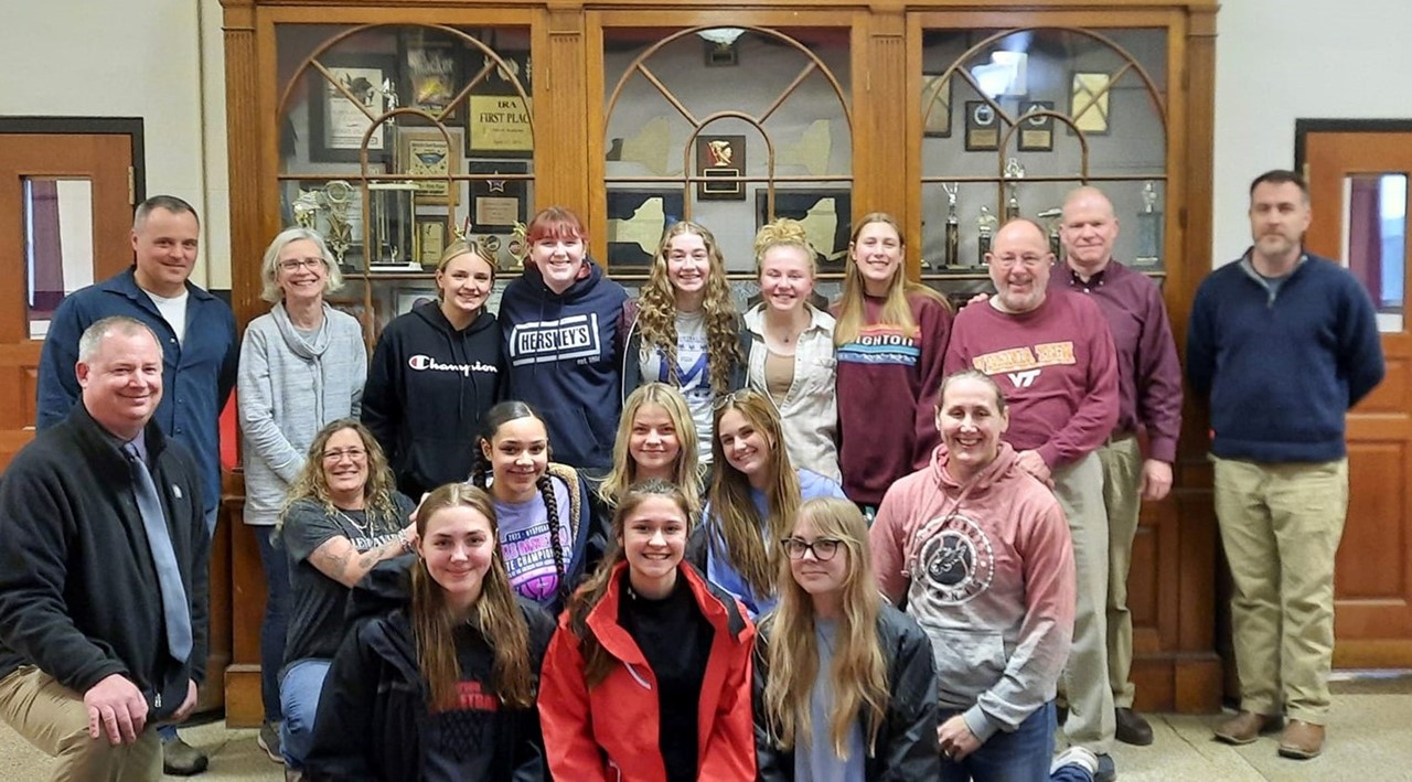 Girls bball team with BOE members