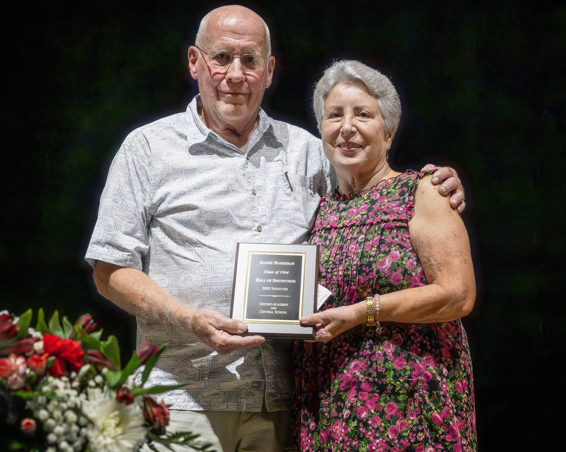 Mr. Emerson and inductee Jeanne Marshman holding plaque