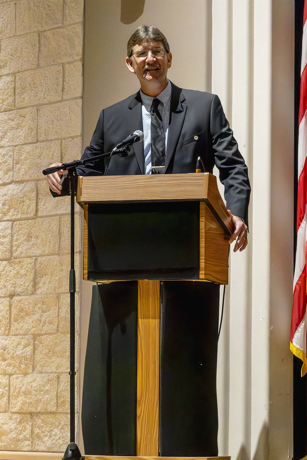 Master of Ceremonies John Jackson at the podium