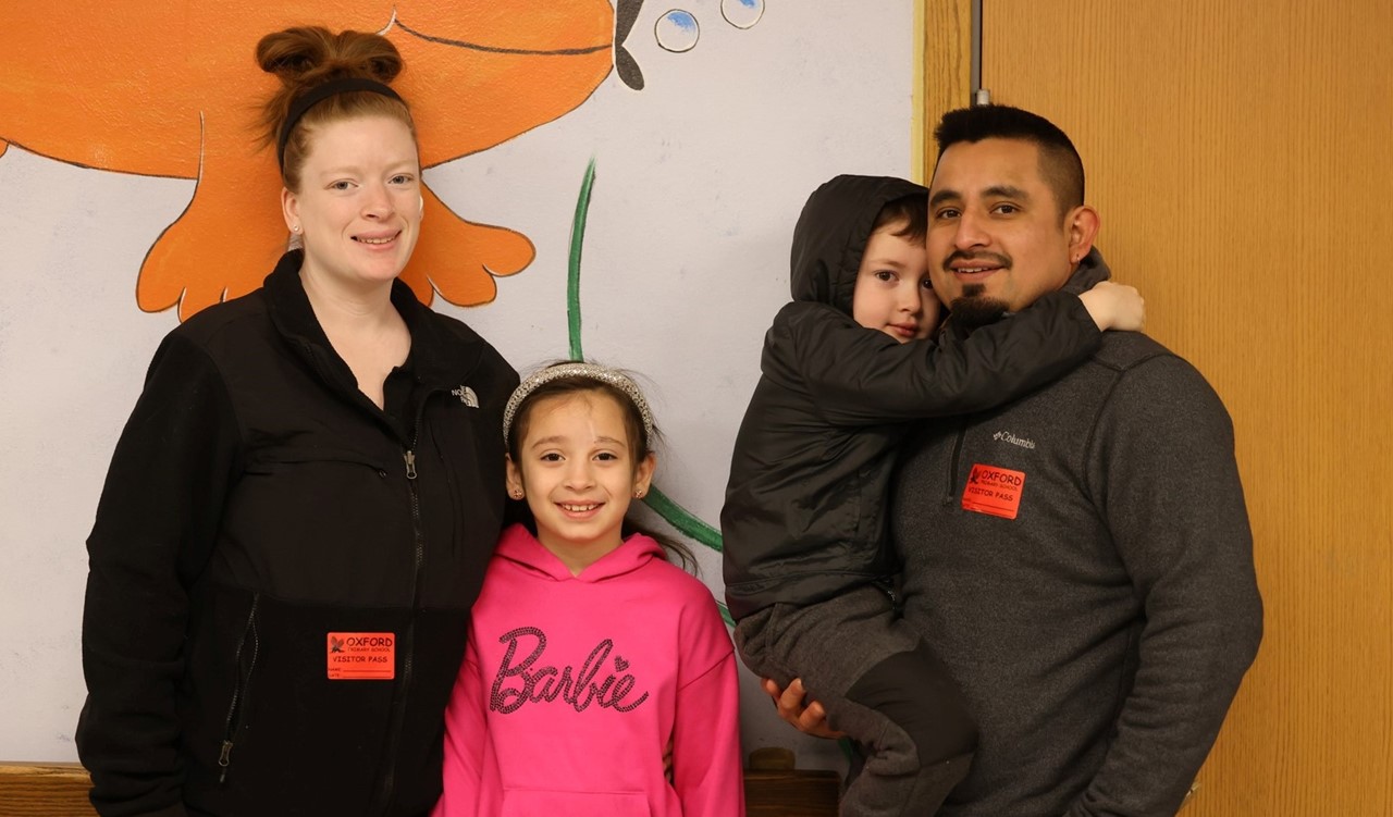 PS parents with kids attending an event