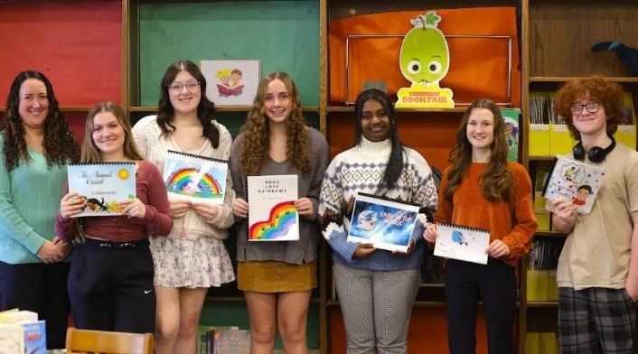 HS sstudents with stories they created